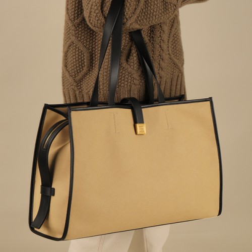 A versatile commuter lightweight, high-capacity tote bag A versatile commuter lightweight, high-capacity tote bag