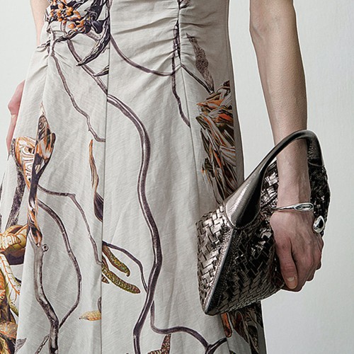 真皮编织饺子包手提包