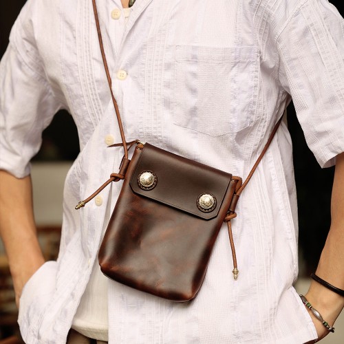 navy leather clutch bag