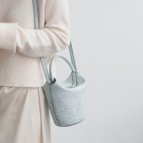 Iced sugar patterned small water bucket bag limited edition Cowhide niche bag Iced sugar patterned small water bucket bag limited edition Cowhide niche bag