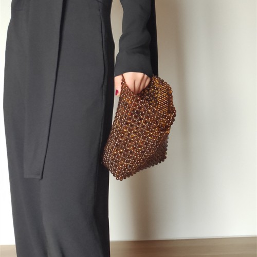 Handheld beaded bag with bead beads