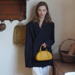 Top layer cowhide retro egg shaped shell bag, single shoulder crossbody handbag, mini women's bag