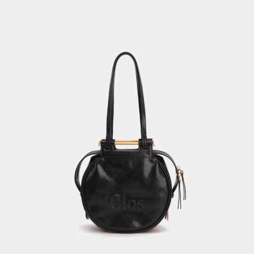 Crossbody bag on one shoulder with a top layer of calfskin commuter tote Crossbody bag on one shoulder with a top layer of calfskin commuter tote