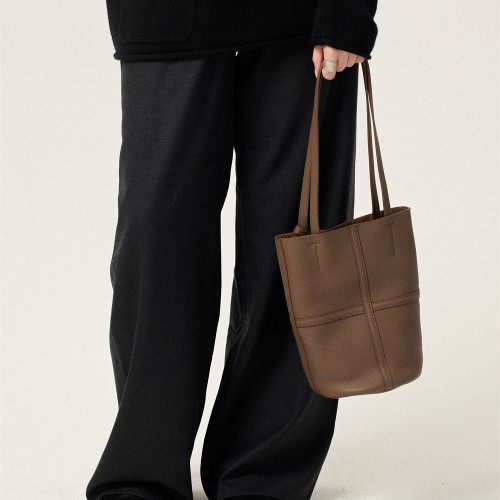 The top layer is a Hobo tote bucket bag  The top layer is a Hobo tote bucket bag