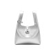 Leather can be worn cross-body in a portable bento bag Leather can be worn cross-body in a portable bento bag