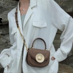 Mini saddle bag, cowhide women's bag, hand-held shoulder bag, crossbody bag, mobile phone bag